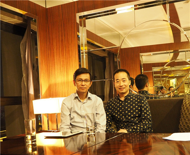 浦君总经理与中国美术家协会副主席何家英先生合影
